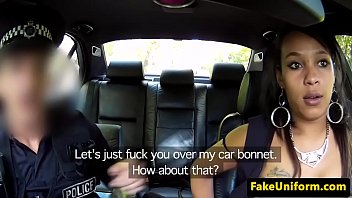 Ebony babe dicksucking officer in his car