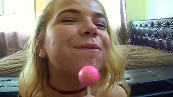 Petite Blonde Sucks Her Lollipop